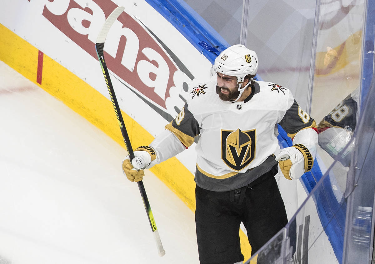 Vegas Golden Knights right wing Alex Tuch celebrates his goal against the Vancouver Canucks dur ...