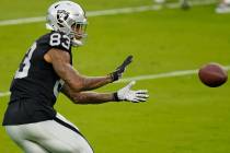 Las Vegas Raiders tight end Darren Waller (83) catches a ball during an NFL football training c ...