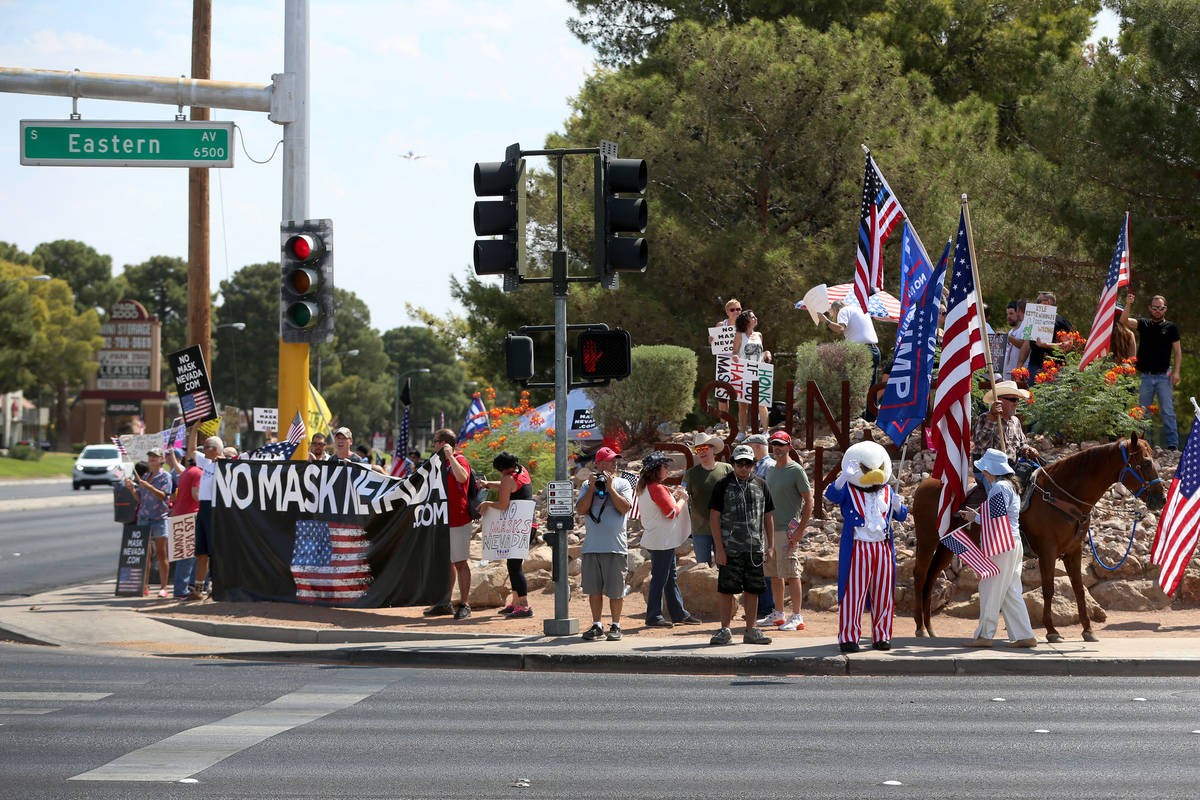 People participate in a No Mask Nevada PAC rally at Sunset Park in Las Vegas, Saturday, Aug. 29 ...