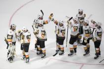 Vegas Golden Knights goalie Robin Lehner, far left, and teammates celebrate their win over the ...