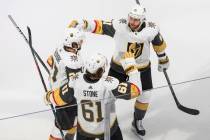 Vegas Golden Knights right wing Mark Stone (61) celebrates his goal against the Vancouver Canuc ...
