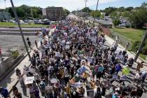Hundreds march at a rally for Jacob Black Saturday, Aug. 29, 2020, in Kenosha, Wis. More than a ...