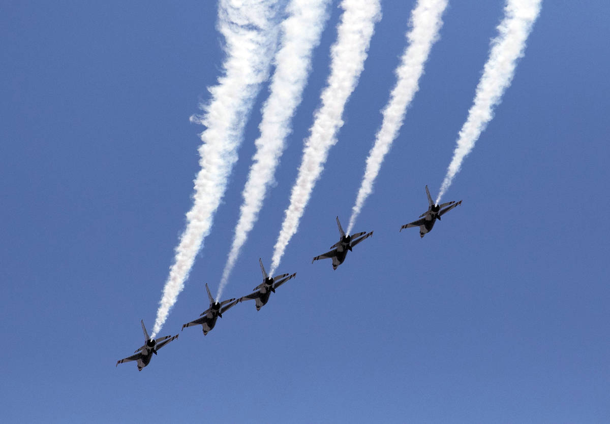 The U.S. Air Force Air Demonstration Squadron "Thunderbirds" do a flyover Red Rock Ca ...