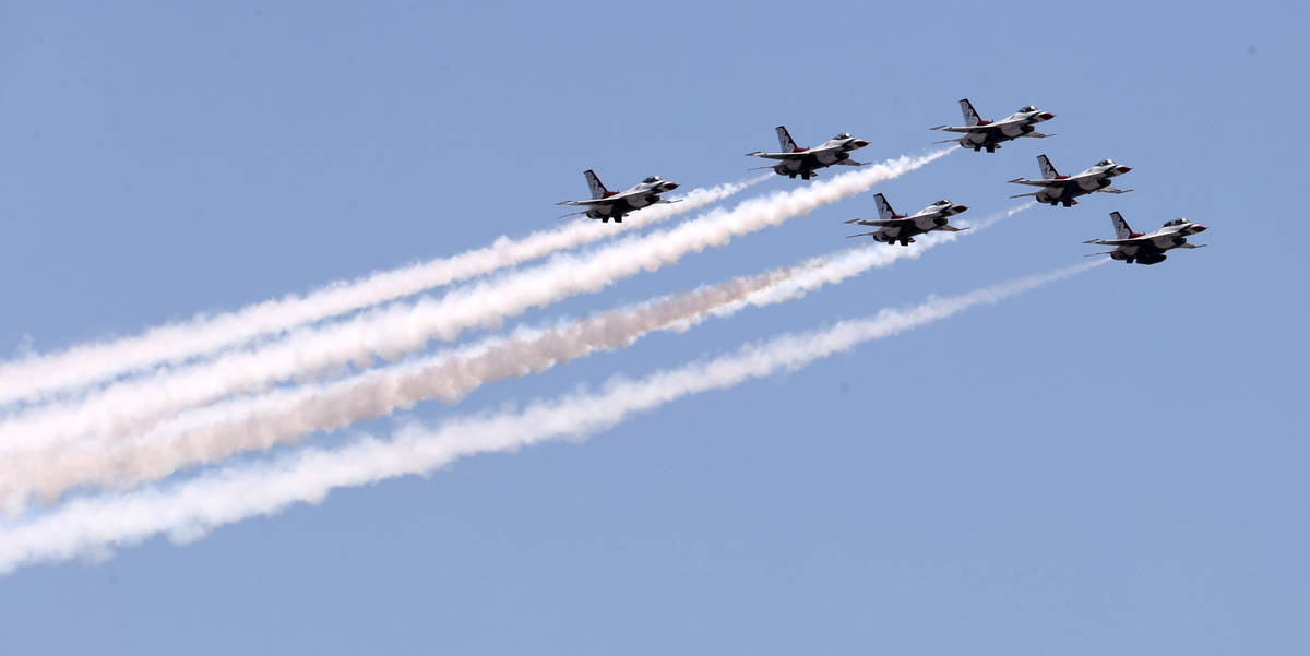 The U.S. Air Force Thunderbirds fly over the Strip in Las Vegas as seen from Treasure Island Mo ...