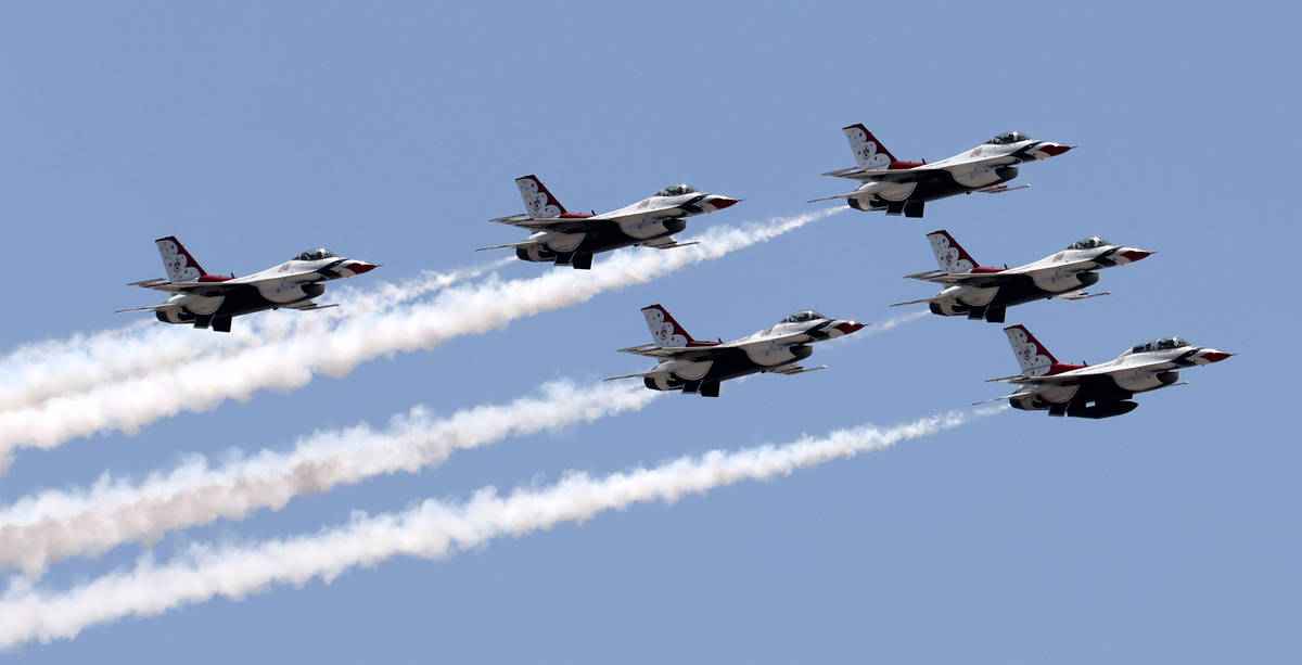 The U.S. Air Force Thunderbirds fly over the Strip in Las Vegas as seen from Treasure Island Mo ...