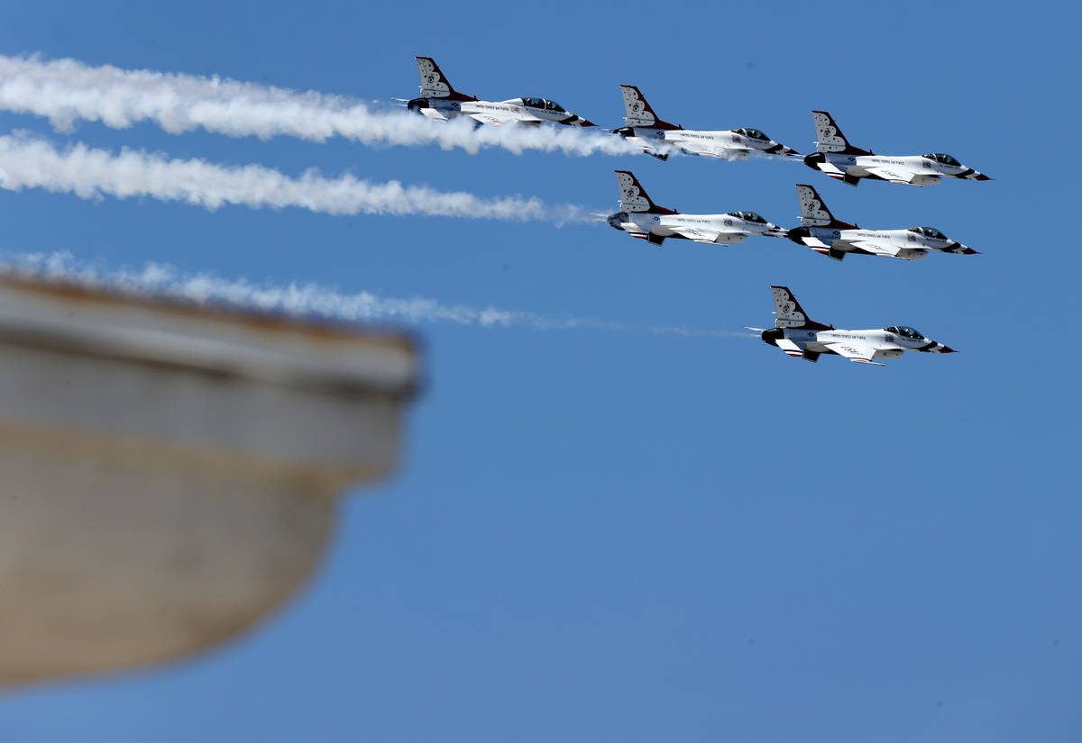 The U.S. Air Force Thunderbirds fly over Treasure Island on the Strip in Las Vegas Monday, Aug. ...