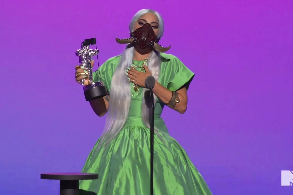 In this video grab issued Sunday, Aug. 30, 2020, by MTV, Lady Gaga accepts the award for song o ...