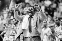 Georgetown coach John Thompson shouts to the floor during the Hoya's NCAA semifinal game agains ...