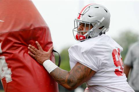 Ohio State Buckeyes defensive tackle Haskell Garrett runs a drill during Ohio State Buckeyes fo ...