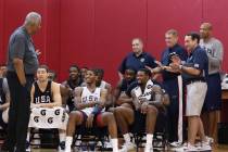 John Thompson, center, a former Georgetown and Olympic men's basketball coach, talks with playe ...