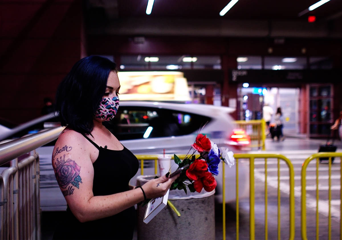 Alisha Burns waits for her sister Amanda Eubanks, whom she hasn't seen in 18 years, at McCarran ...
