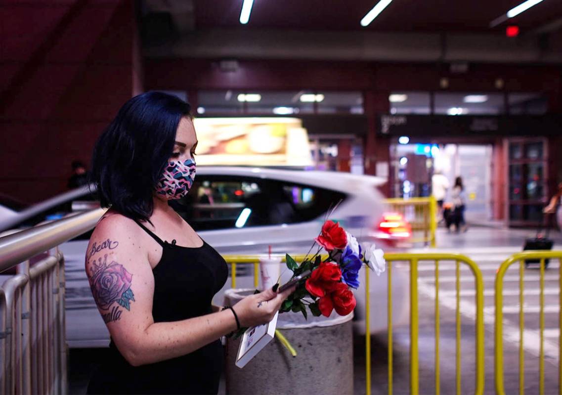 Alisha Burns waits for her sister Amanda Eubanks, whom she hasn't seen in 18 years, at McCarran ...