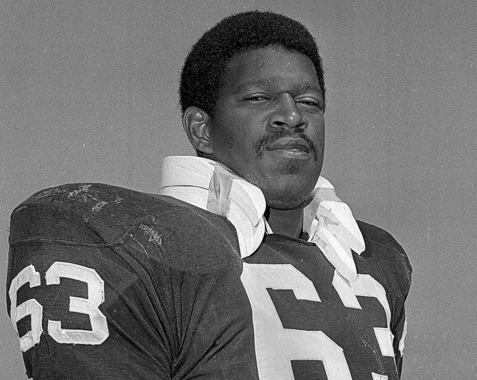 FILE - In this Aug. 15, 1970, file photo, Gene UpShaw poses when he was playing left guard for ...