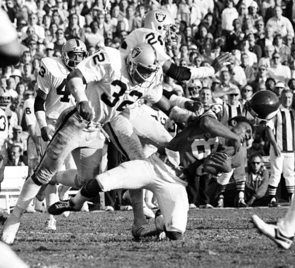 FILE*** This Jan. 9, 1977 file photo shows Minnesota Vikings wide receiver Sammy White losing ...