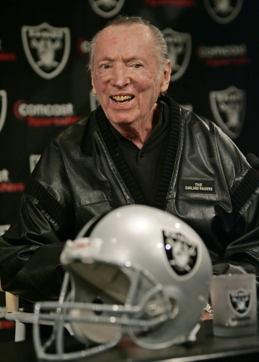 Oakland Raiders head coach Al Davis smiles during an NFL football news conference at Raiders he ...
