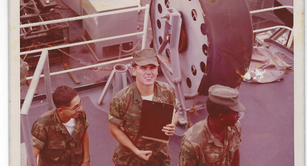 Patrick Brown, center, appears in an undated snapshot from his service as a U.S. Marine. (Micha ...