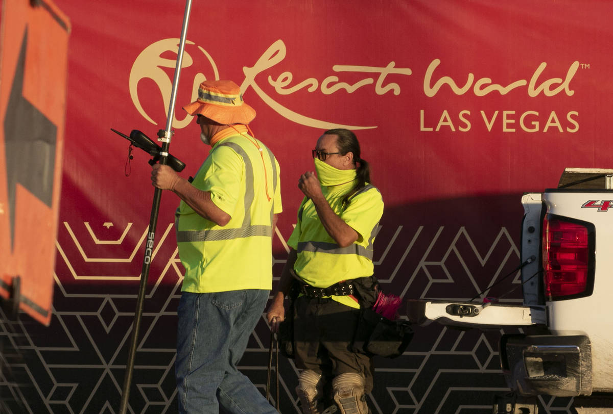 Construction workers are seen at the Resorts World construction site, on Monday, Aug. 31, 2020, ...