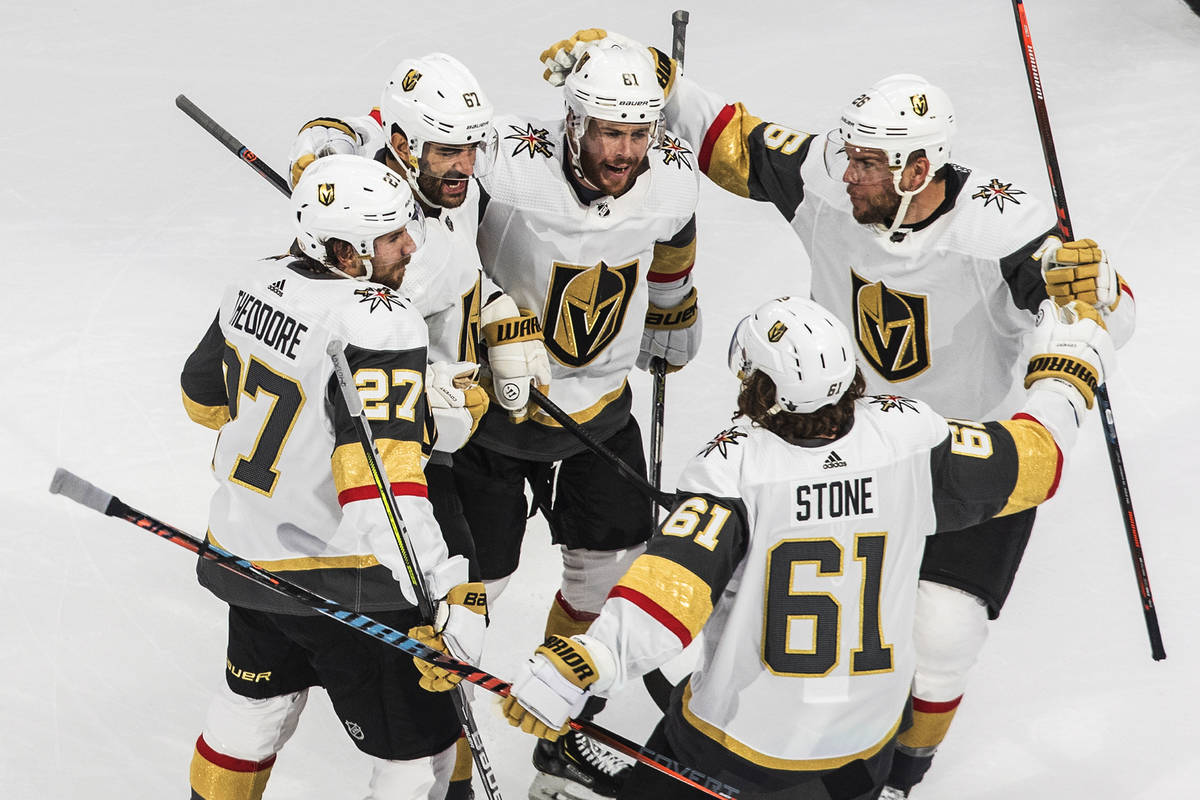 Vegas Golden Knights' Shea Theodore (27), Max Pacioretty (67), Mark Stone (61), Paul Stastny (2 ...