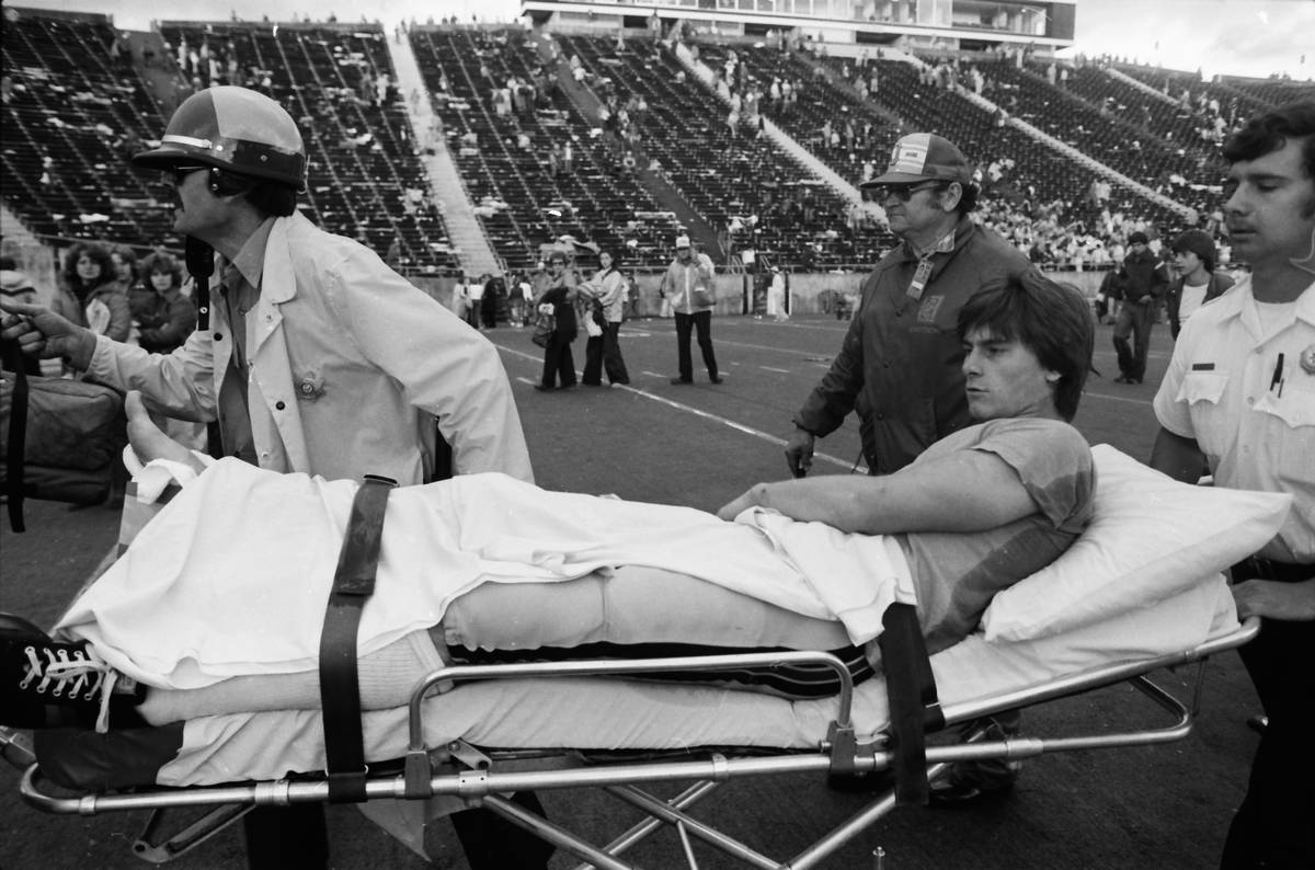 UNLV quarterback Kenny Mayne breaks his right ankle at Oregon on Oct. 25, 1980. (The Register-G ...