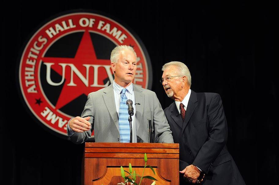 Kenny Mayne, left, speaks with Dick Calvert at the UNLV Athletics Hall of Fame induction ceremo ...