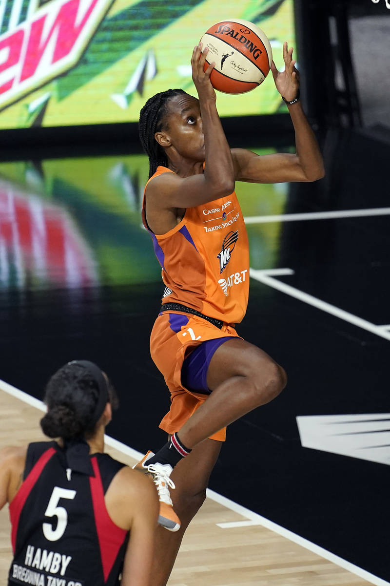 Phoenix Mercury guard Shatori Walker-Kimbrough (2) shoots over Las Vegas Aces forward Dearica H ...