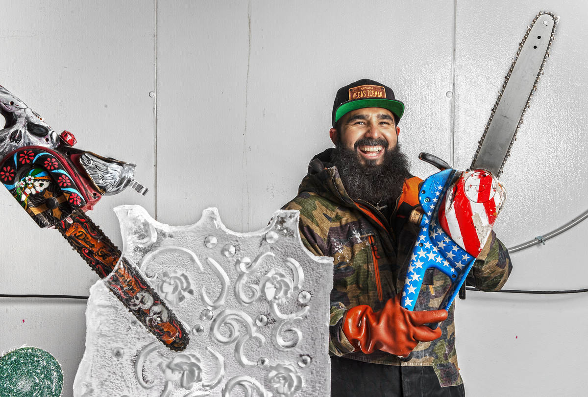 Marco Villarreal, known as "Vegas Ice Man," holds a custom painted chainsaw he uses t ...