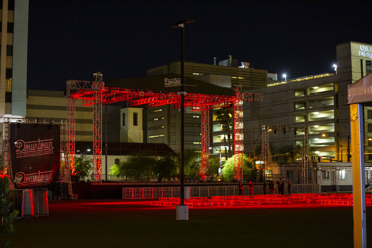 Red lights for the "Red Alert" campaign light up the stage at the Downtown Las Vegas ...