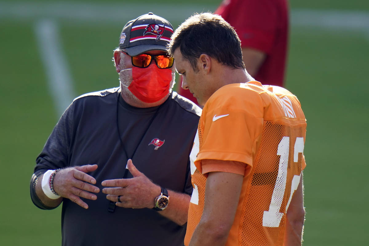 Tampa Bay Buccaneers head coach Bruce Arians talks to quarterback Tom Brady (12) during an NFL ...