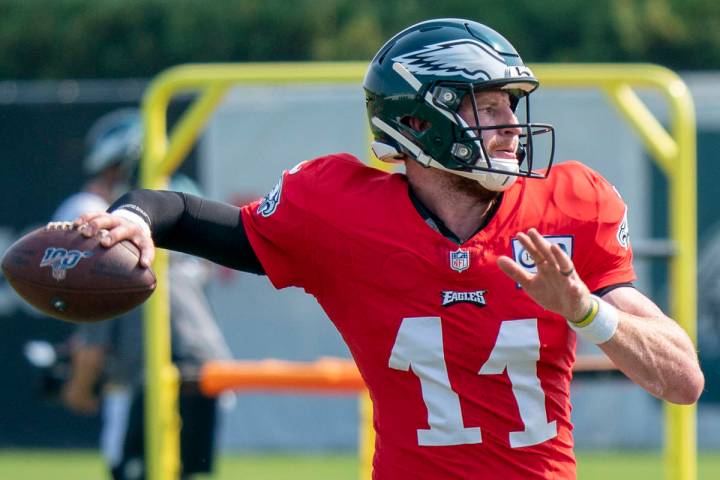 Philadelphia Eagles quarterback Carson Wentz in action during an NFL football practice, Thursda ...