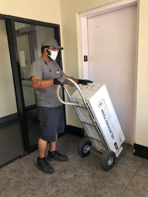 Move 4 Less mover Drew Potts transported new beds into HELP of Southern Nevada's seven clients' ...