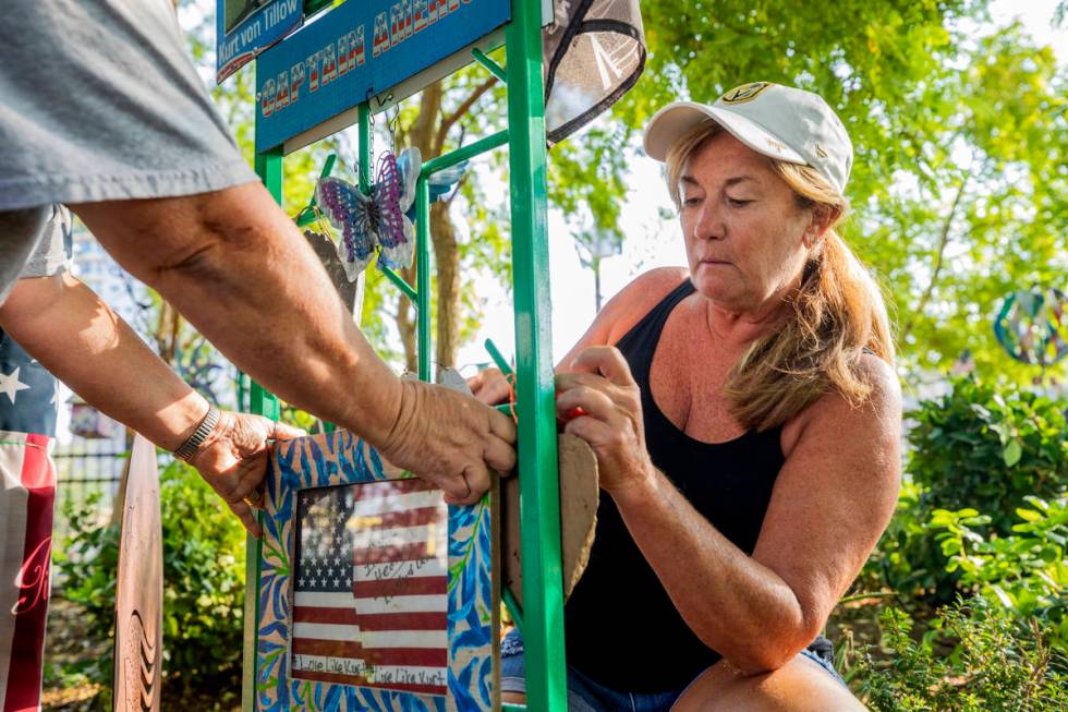 Volunteer Alicia Mierke works on a memorial trellis at the Healing Garden on Sept. 14. (Elizabe ...