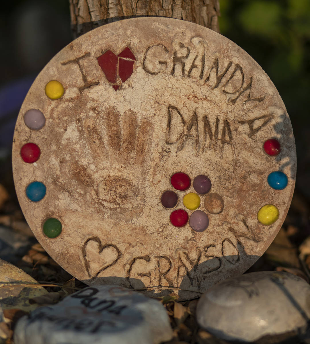 Relics seen around memorials for victims of Route 91, at the Las Vegas Healing Garden, in Las V ...