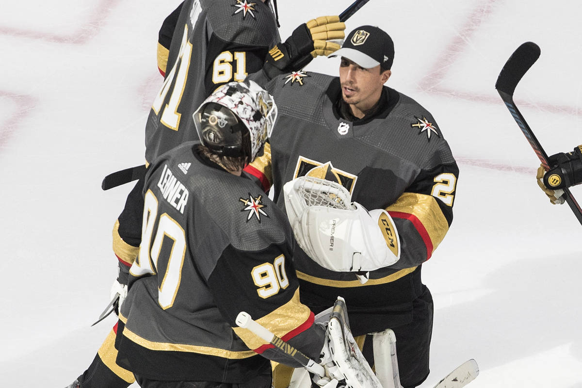 Vegas Golden Knights goalies Robin Lehner (90) and Marc-Andre Fleury (29) celebrate the team's ...