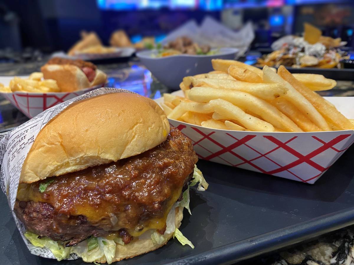 The Linebacker Bison Burger is one of the menu items available at Golden Circle Sportsbook and ...