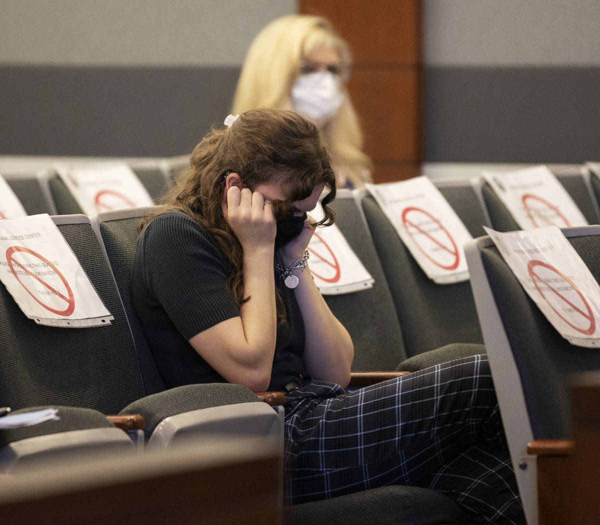 Friends and family of Melissa Newton, a mother of 3 killed in a DUI crash, react during the sen ...