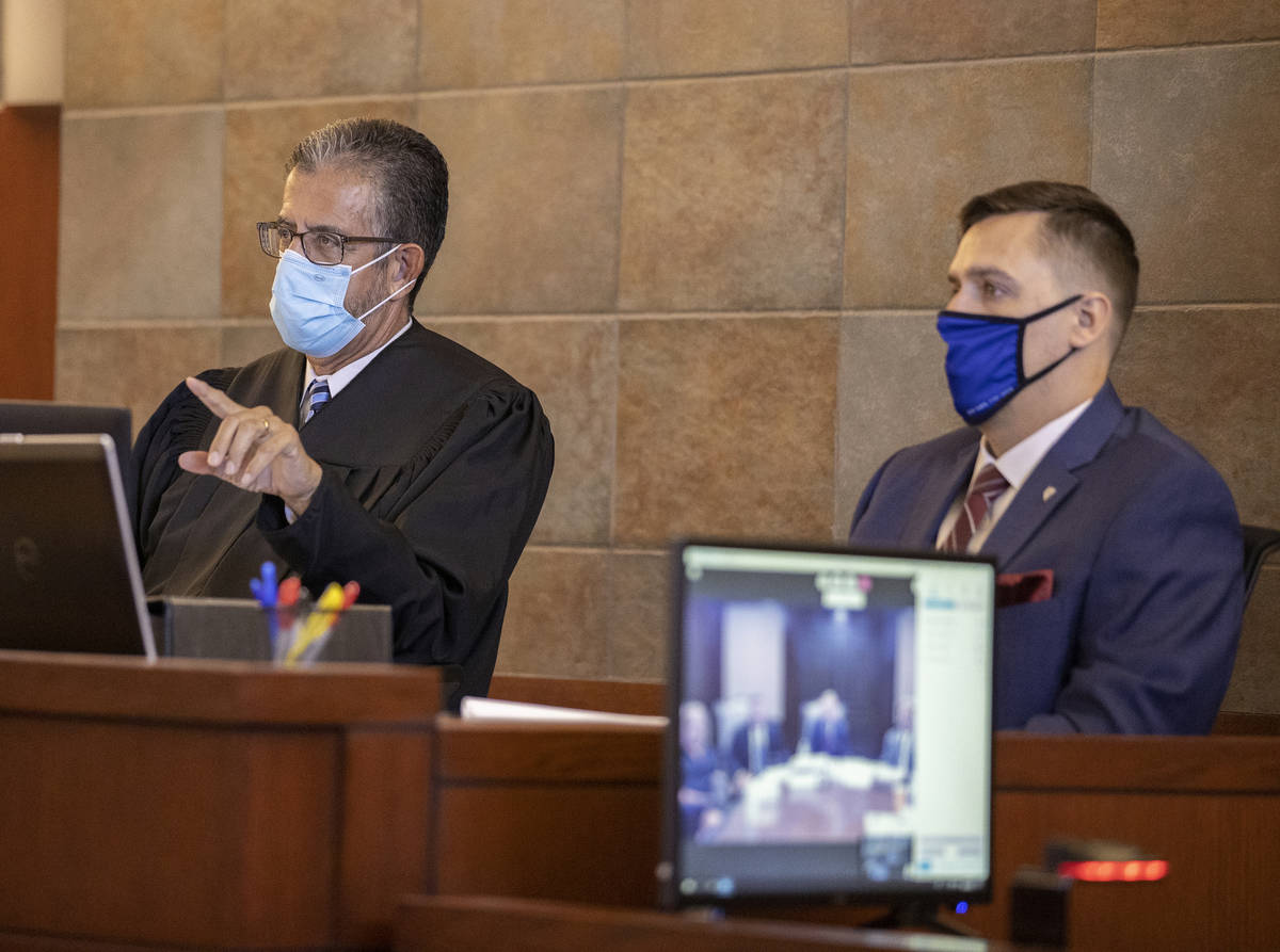 Judge Michael Villani, left, addresses attorneys during a sentencing hearing for Scott Gragson, ...