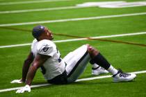 In this Aug. 25, 2020, file photo, Las Vegas Raiders safety Damarious Randall warms up during a ...