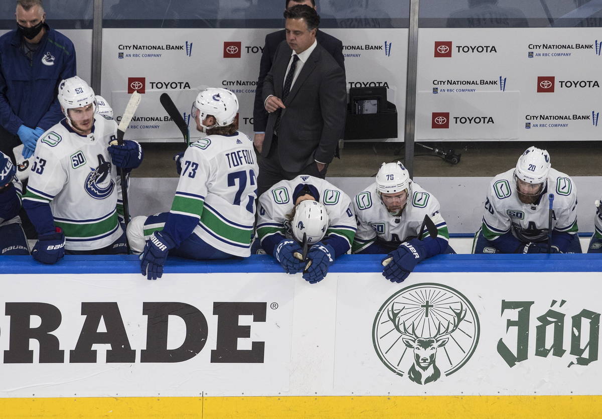 Vancouver Canucks react to their loss to the Vegas Golden Knights in Game 7 of an NHL hockey se ...