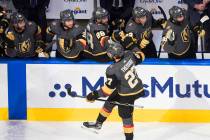 Vegas Golden Knights' Shea Theodore (27) is congratulated for his goal against the Vancouver Ca ...