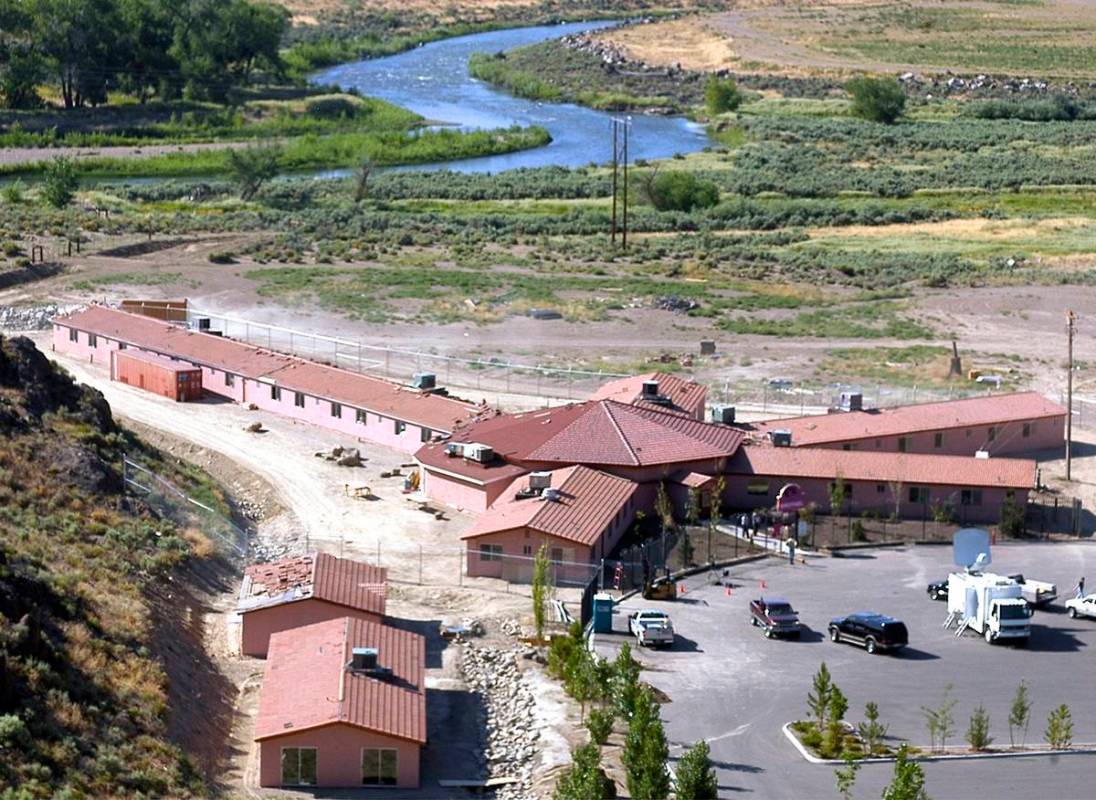 This Friday, July 1, 2005, file photo, shows the Mustang Ranch in the Truckee River canyon near ...