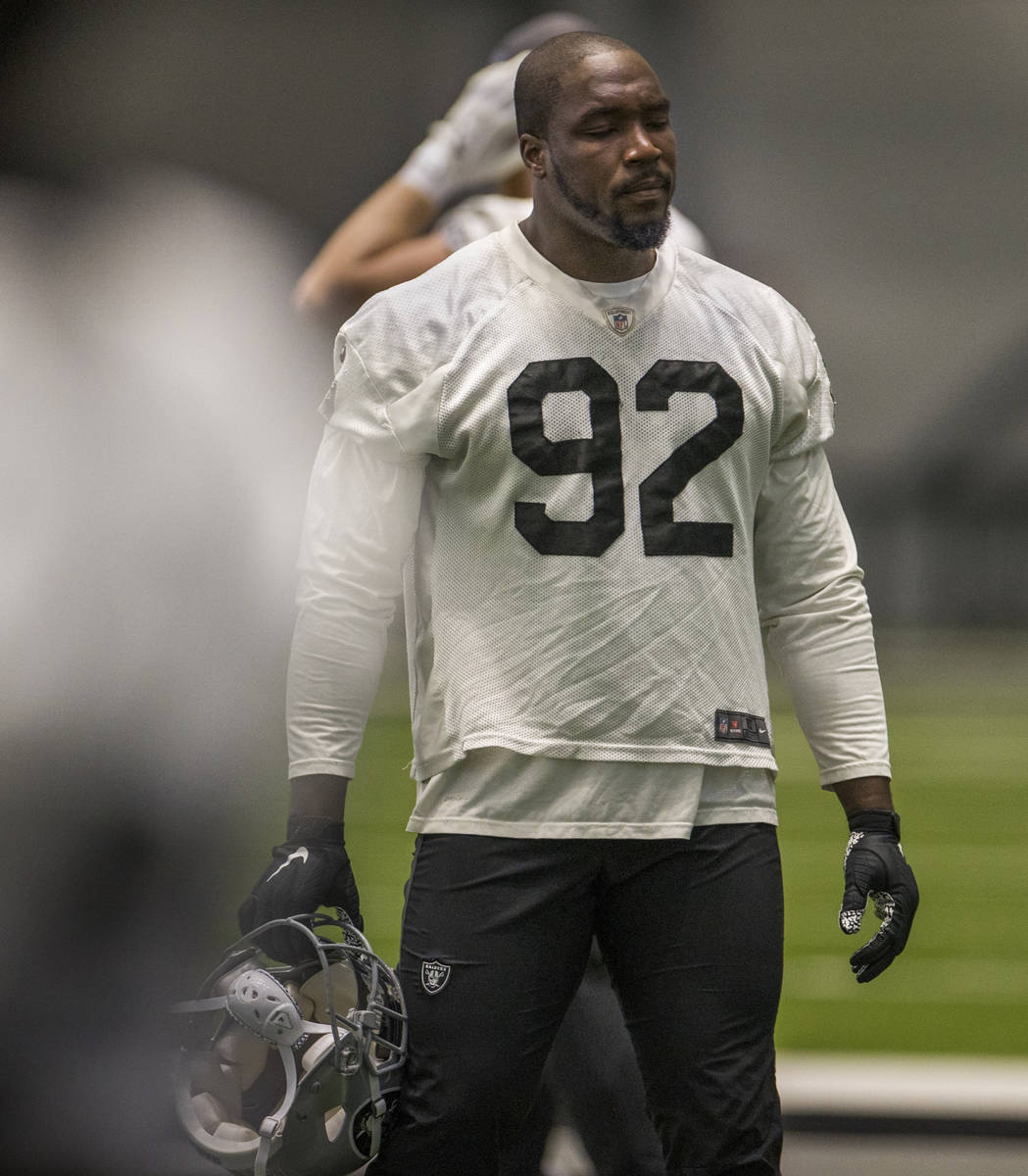 In this Sept. 3, 2020, file photo, Las Vegas Raiders defensive end Chris Smith (92) stands with ...