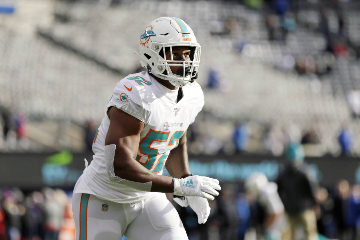 FILE - In this Dec. 15, 2019, file photo, Miami Dolphins middle linebacker Raekwon McMillan (52 ...