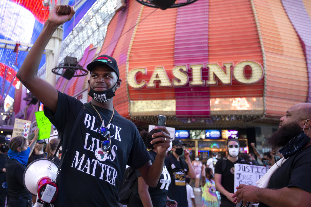 Vance "Stretch" Sanders raises a fist during the "Justice For Breonna Taylor and ...