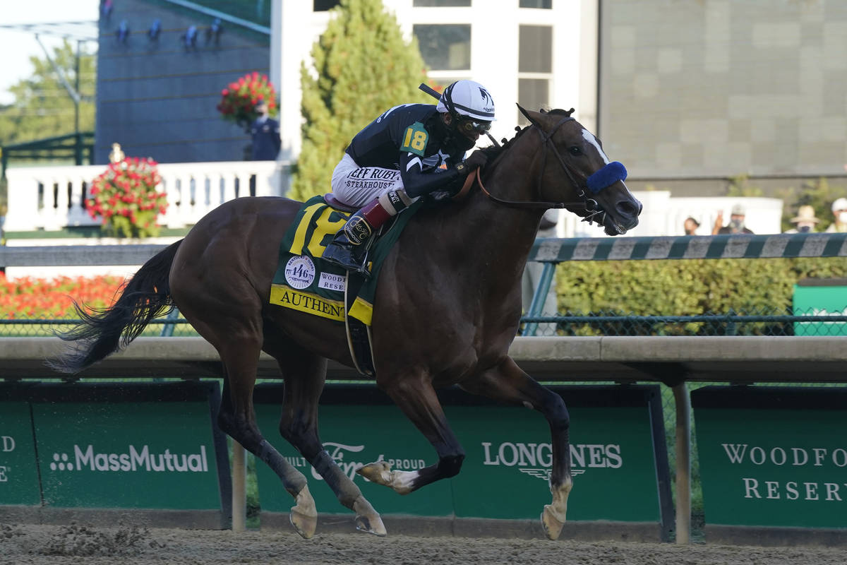 Jockey John Velazquez riding Authentic heads to the finish line to win the 146th running of the ...