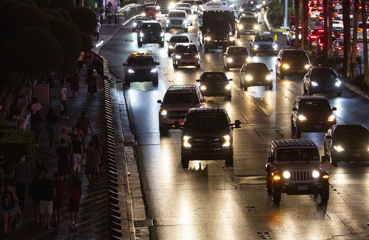 Traffic fills Las Vegas Boulevard as visitors crowd the Strip during