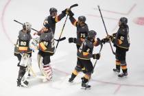 Vegas Golden Knights celebrate a 3-0 win over the Dallas Stars in Game 2 of the NHL hockey West ...