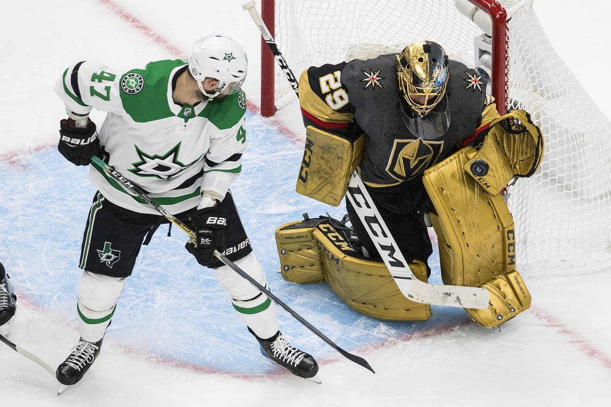 Vegas Golden Knights goalie Marc-Andre Fleury (29) makes a save on Dallas Stars' Alexander Radu ...