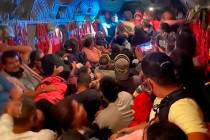 California National Guard shows dozens of evacuees are evacuated to safety on a Cal Guard Chino ...