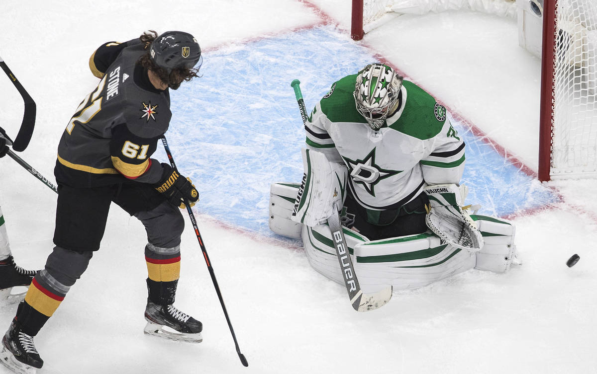 Vegas Golden Knights' Mark Stone (61) is stopped by Dallas Stars goalie Anton Khudobin (35) dur ...