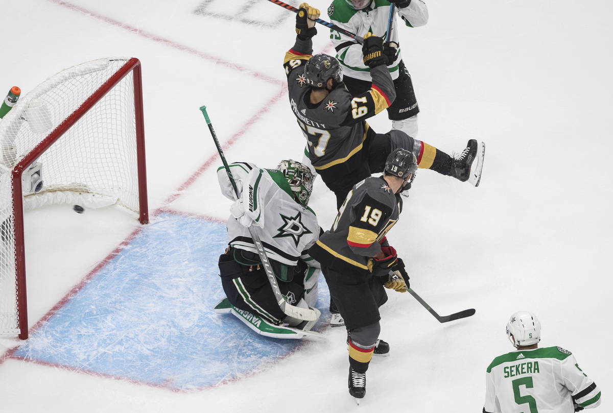 Dallas Stars goalie Anton Khudobin (35) gives up an apparent goal as Vegas Golden Knights' Max ...